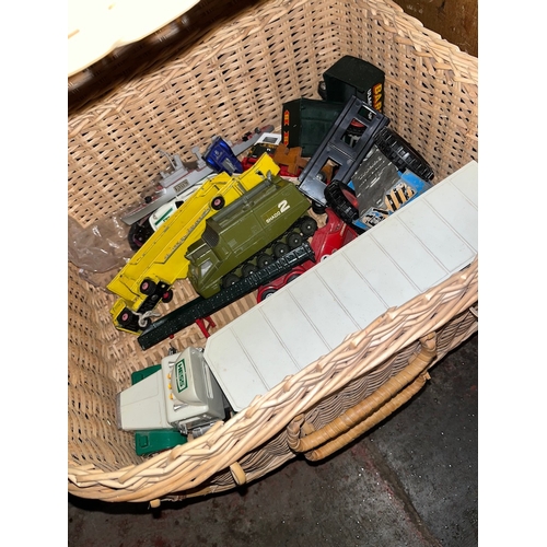 68 - A wicker basket containing Matchbox, Triang, Corgi  and Dinky toys