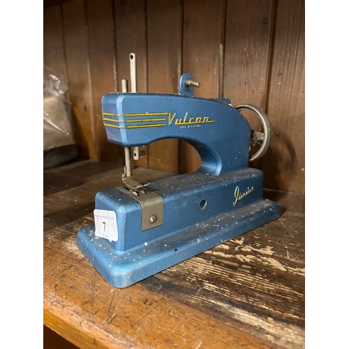 7 - A Vulcan Junior hand cranked sewing machine