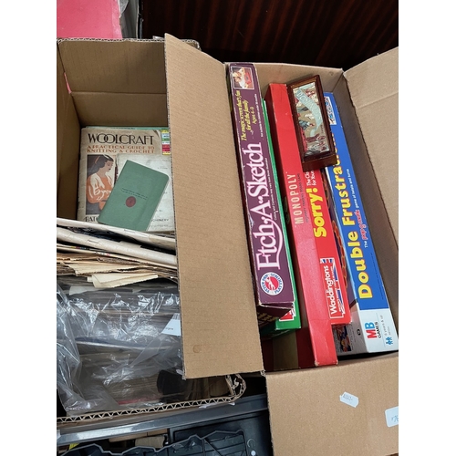 76 - A box of ephemera, etc and a box of board games.