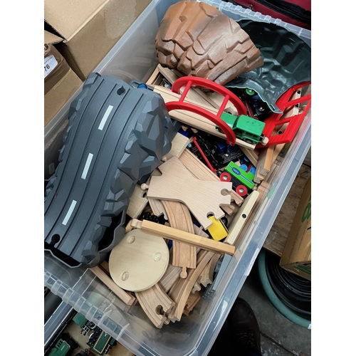 77 - A large box of wooden track, trains and toys + accessories.