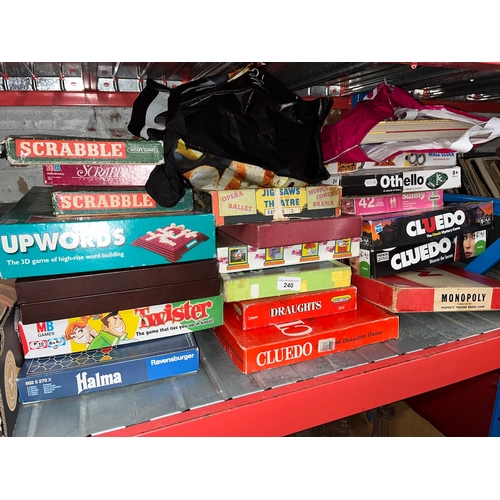 240 - A collection of vintage board games including Scrabble, Cluedo etc.