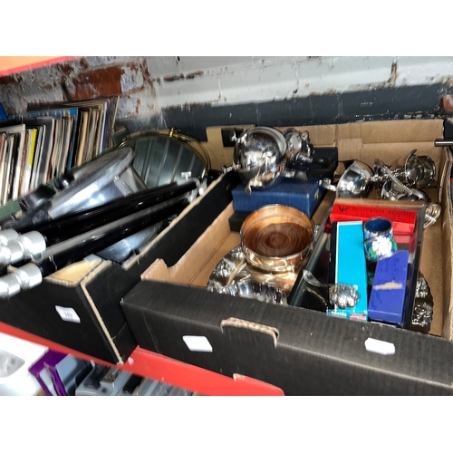 242 - Two boxes of metalware including plated and stainless teaware, trivet, brass shaving mirror etc