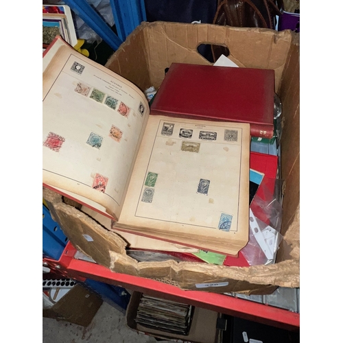 328 - A box of stamp albums and loose stamps.