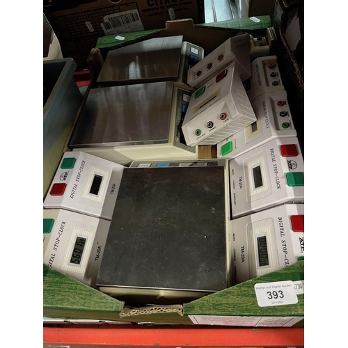 393 - A box of digital scales and stop clocks.