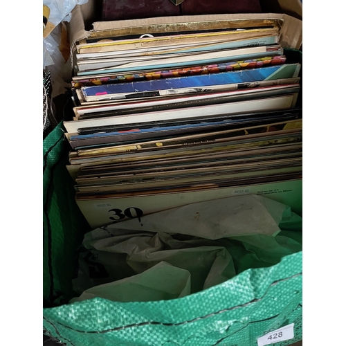 428 - A bag of assorted LPs, a box of Dickens vols. and a pair of opera glasses.