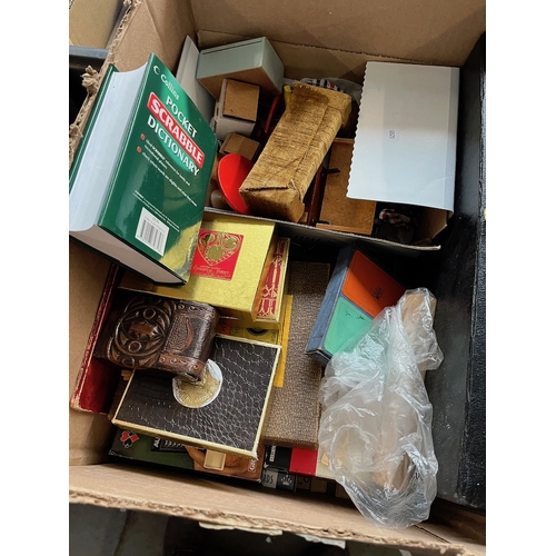 434 - A box of games, playing cards, and dolls house furniture