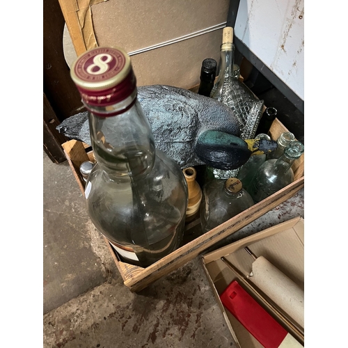 456 - A box of bottles including an empty gallon Bells whisky bottle