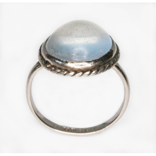 43 - An antique moonstone cabochon ring, the bezel set flat bottom and round cut cabochon weighing approx... 