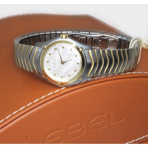 63 - A ladies Ebel Sport Classic stainless steel wristwatch, mother of pearl dial with gold tone dot hour... 