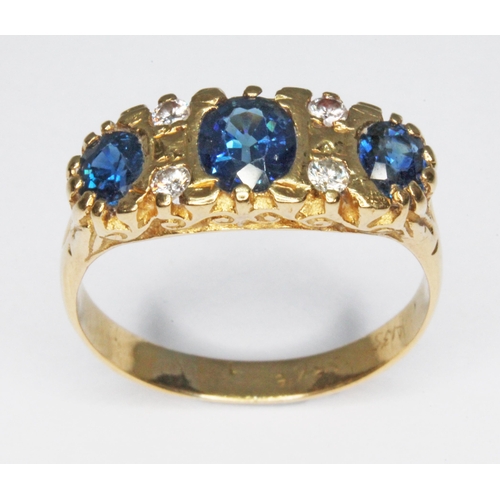 117 - A sapphire and diamond cluster ring, the oval cut sapphires weighing approx. 0.25ct, 0.64ct & 0.28ct... 