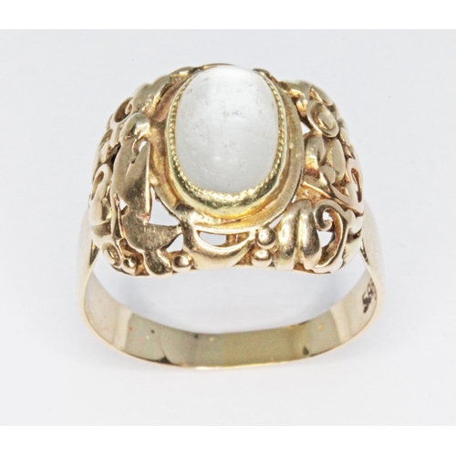 144 - A moonstone cabochon ring, marked '585', gross wt. 4.5g, size S.