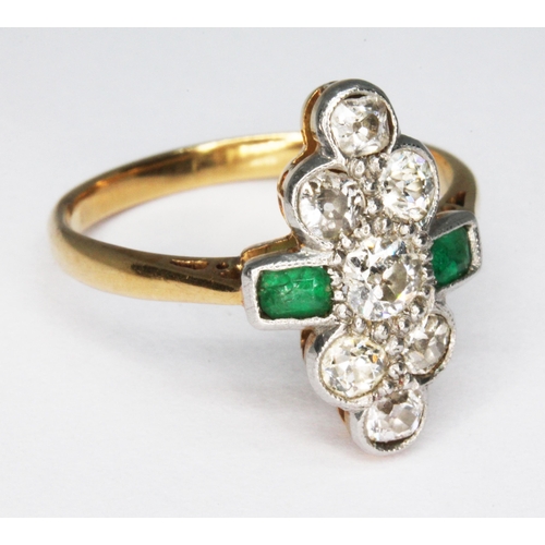 235 - An early 20th century emerald and diamond ring, the millegrain set cluster measuring approx. 16.94mm... 