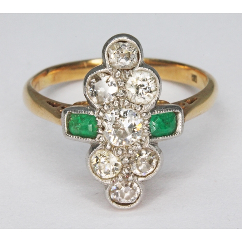 235 - An early 20th century emerald and diamond ring, the millegrain set cluster measuring approx. 16.94mm... 