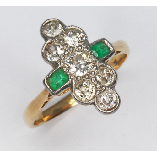 235 - An early 20th century emerald and diamond ring, the millegrain set cluster measuring approx. 16.94mm... 