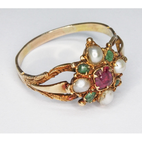 236 - A mid 19th century ruby, emerald and half-pearl cluster ring, the multi-gem set cluster measuring ap... 