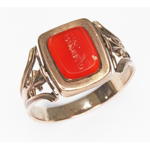 239 - A Georgian mourning ring, swivel panel set with a carnelian seal to one side and the other engraved ... 