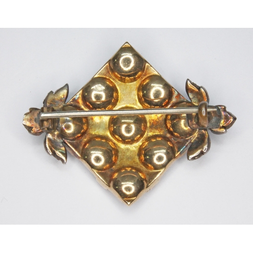 243 - A Georgian diamond brooch, formed from a rhombus cluster of nine rose cut diamonds interspersed with... 