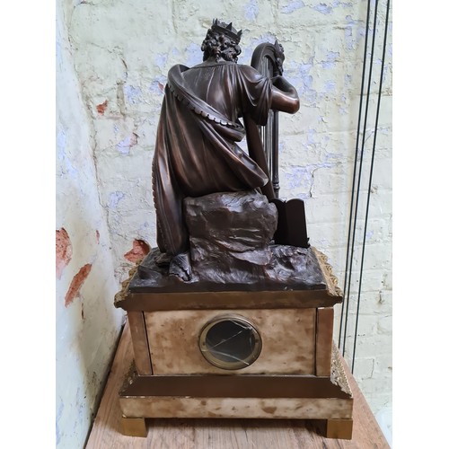 294 - A large French late 19th century figural mantle clock, the bronze top depicting King David playing t... 