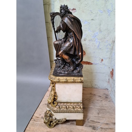 294 - A large French late 19th century figural mantle clock, the bronze top depicting King David playing t... 