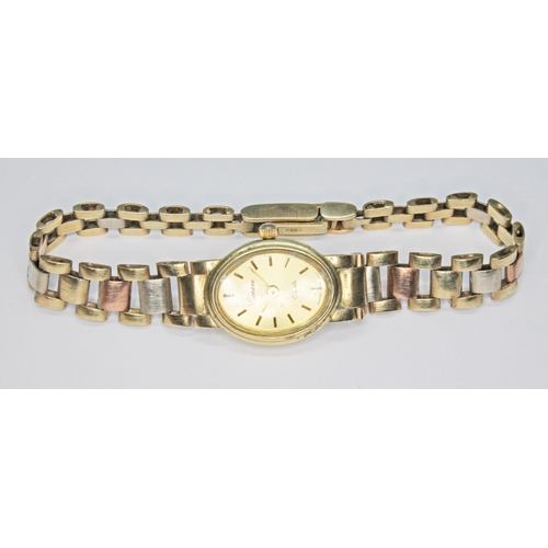 275 - A Geneve quartz ladies 9ct gold watch with a 9ct gold strap band, gross wt. 16g.