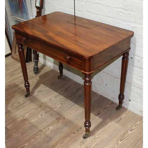 297 - A Gillows mahogany chamber writing table, second quarter of the 19th century, inkwell compartment, s... 