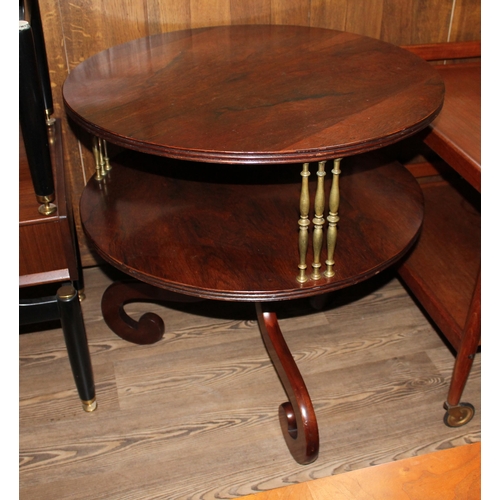 300 - A Regency rosewood dumb waiter, two tier supported by brass columns, scroll legs, diameter 71cm & he... 