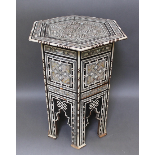 301 - A Moorish bone and mother of pearl inlaid occasional table, height 78cm.