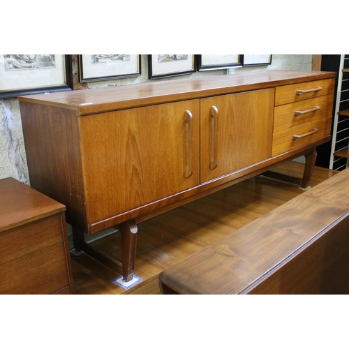 305 - A retro teak sideboard, length 184cm.