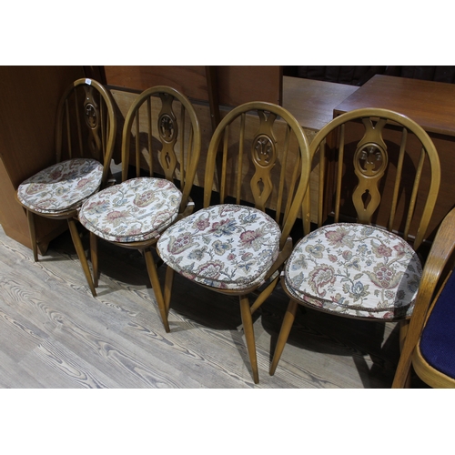 313 - A set of four Ercol Golden Dawn chairs.