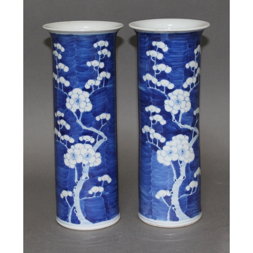 339 - A pair of Chinese porcelain blue and white sleeve vases, each bearing four character Kangxi mark, he... 