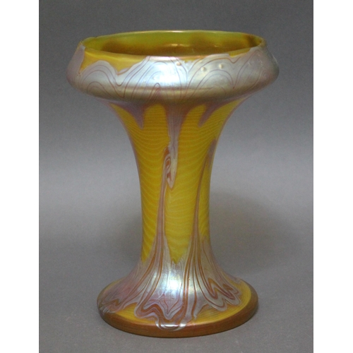 340 - An Austrian Art Nouveau glass vase by Loetz, trumpet form, wavy yellow ground with iridescent trials... 