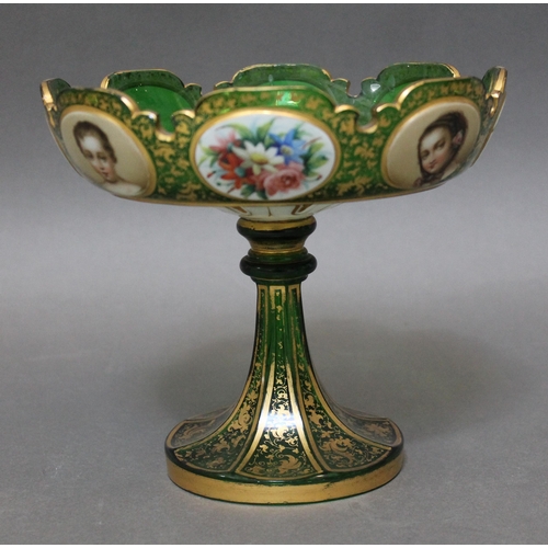 341 - A Bohemian green glass tazza, with painted portrait and floral panels within gilt decoration, height... 