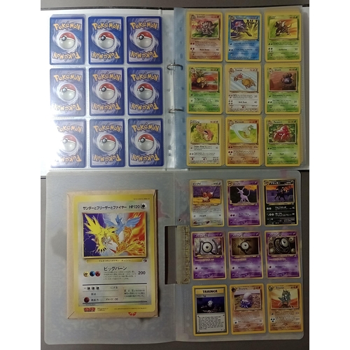 161 - A collection of Pokemon cards including folder of 1990s cards, a plastic folder of Neo promotional c... 