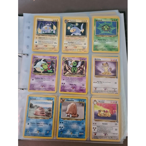 161 - A collection of Pokemon cards including folder of 1990s cards, a plastic folder of Neo promotional c... 