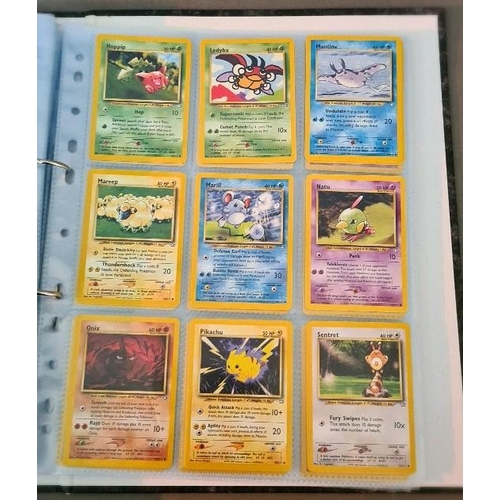 161 - A collection of Pokemon cards including folder of 1990s cards, a plastic folder of Neo promotional c... 