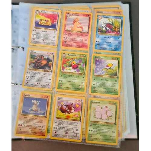 161 - A collection of Pokemon cards including folder of 1990s cards, a plastic folder of Neo promotional c... 