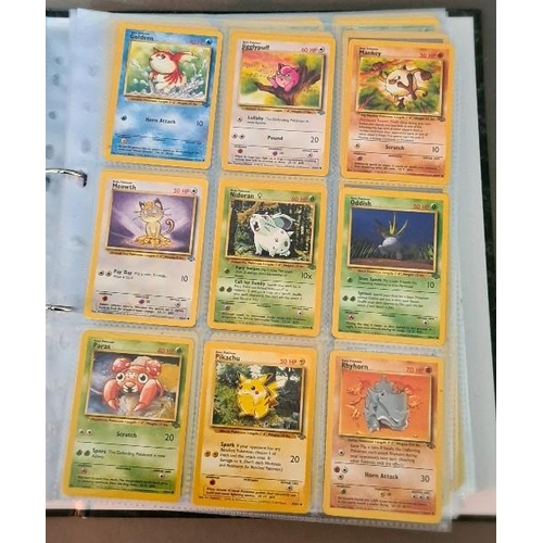 161 - A collection of Pokemon cards including folder of 1990s cards, a plastic folder of Neo promotional c... 