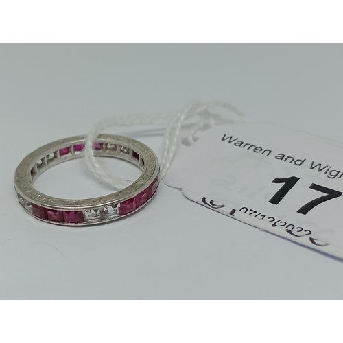 17 - A synthetic ruby and sapphire full eternity ring, engraved outer edge, channel set princess cut ston... 