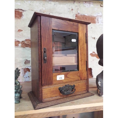 170 - An Edwardian walnut smoker's cabinet.