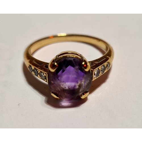 20 - A yellow metal amethyst ring, with diamond set shoulders, gross weight 3.9 grams together with a rol... 