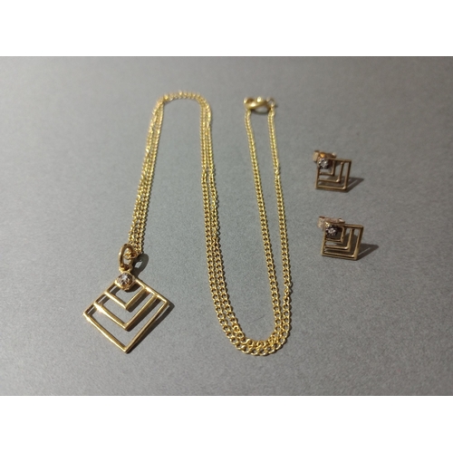 64 - A duo set comprised of a 9ct gold chain with pendant together with matching pair of 9ct gold earring... 