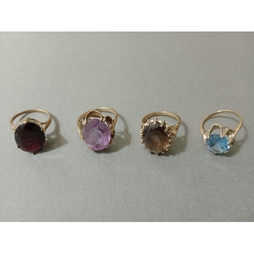 8 - Four assorted hallmarked 9ct gold rings, various stones, gross wt. 17.4g, sizes M to P.