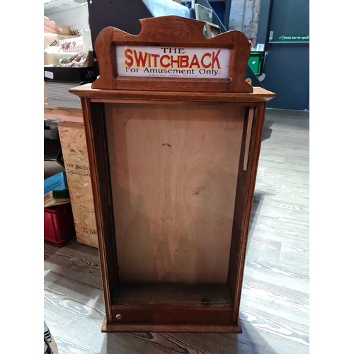 403 - An early 20th century vintage Switchback penny arcade, with keys and ball bearings.