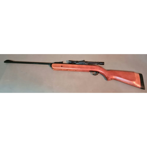 12 - A B.S.A .22 calibre air rifle with B.S.A. 4x20 sight, serial no. ZB32414, 111cm long (BUYER MUST BE ... 