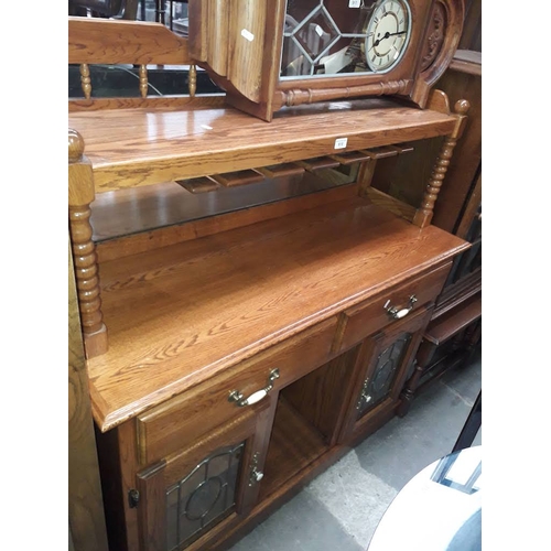 950 - An oak mirror back sideboard and a folding wine rack.