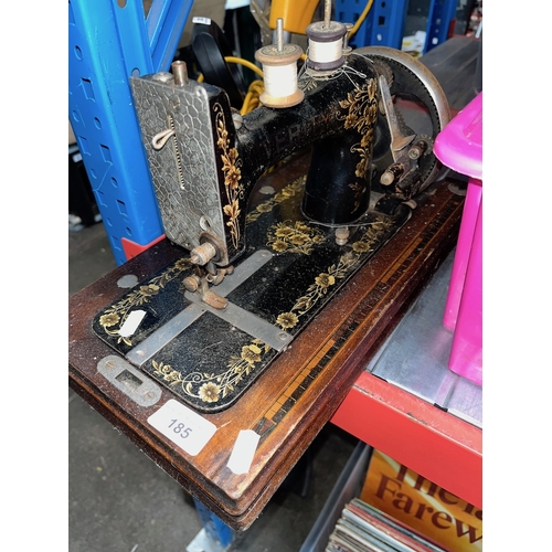 253 - A vintage handcrank Verity sewing machine.