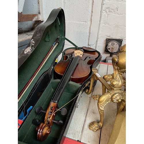 110 - A student violin with bow, in hard case.