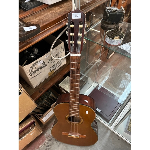 114 - A Spanish Tenada model 500 nylon strung guitar.