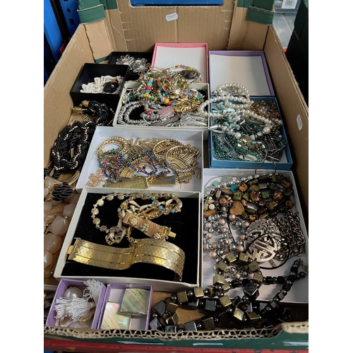 155 - A tray of costume jewellery including silver.