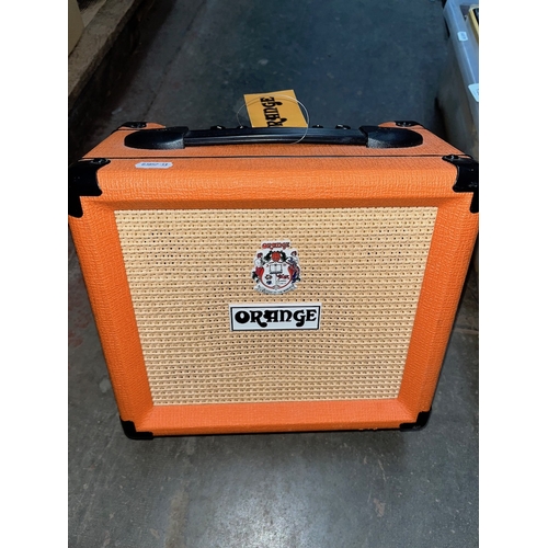 77 - An Orange Crush 12 guitar amplifier.